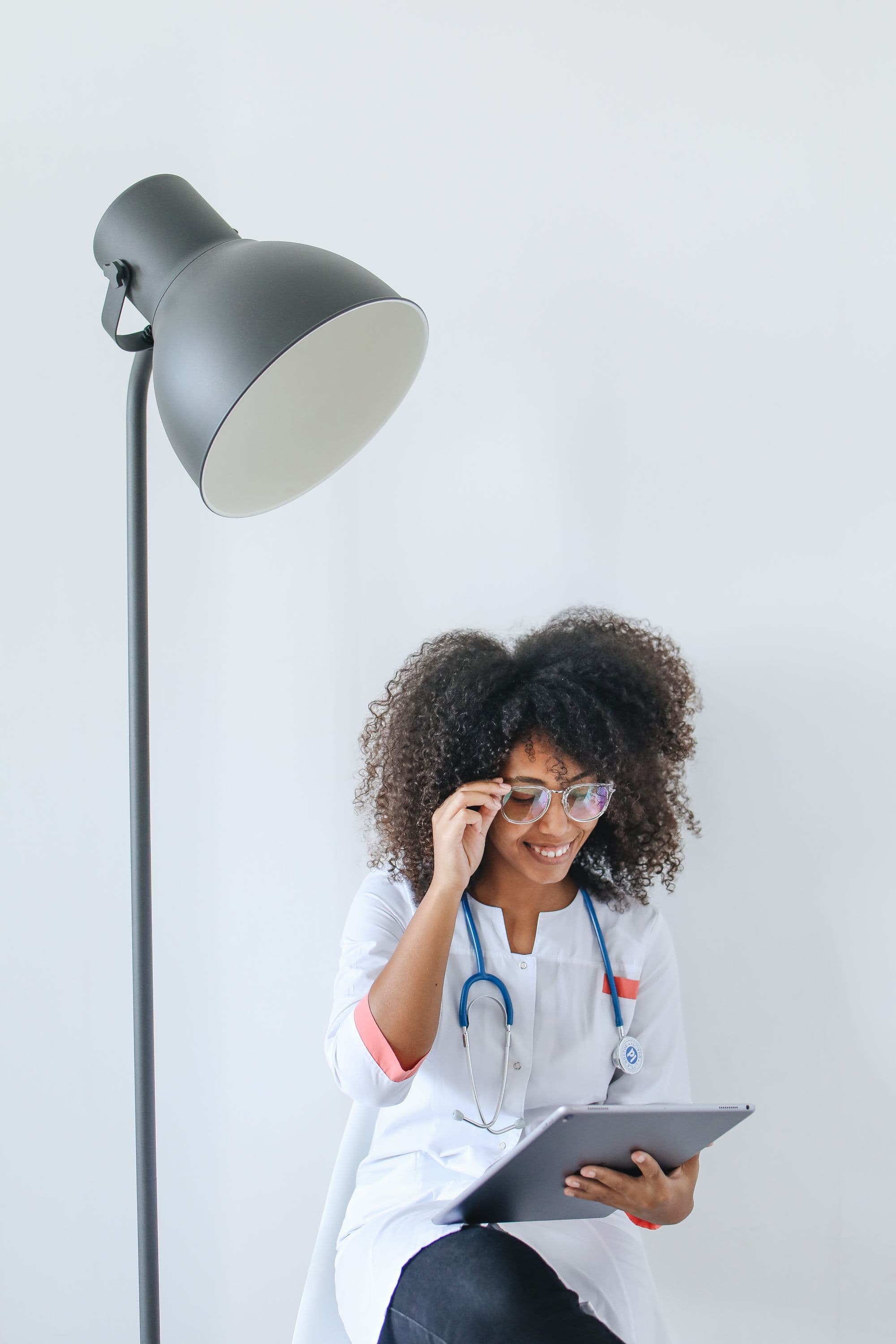 A Devine Medical Group nurse caring for a patient